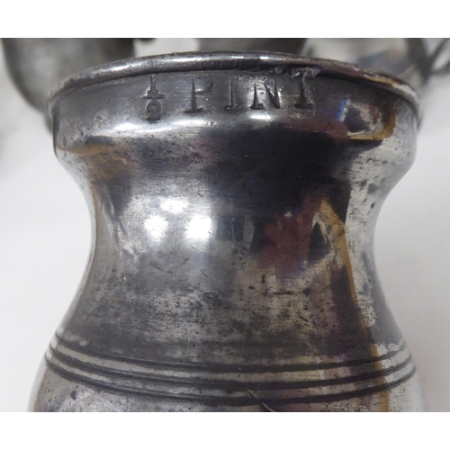 79 - Fourteen 17th and 18thC pewter, baluster shape measures  largest approx. one pint