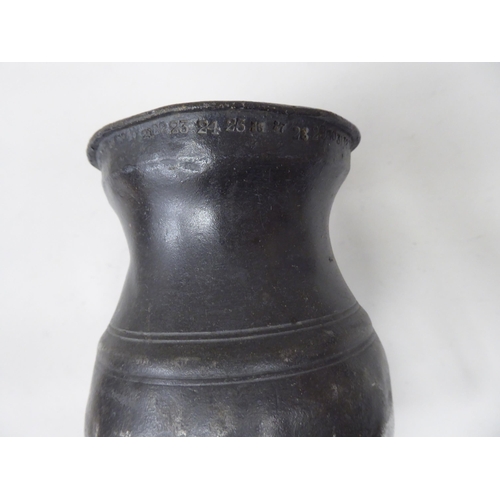 79 - Fourteen 17th and 18thC pewter, baluster shape measures  largest approx. one pint