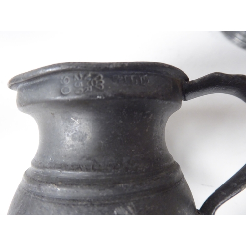 79 - Fourteen 17th and 18thC pewter, baluster shape measures  largest approx. one pint