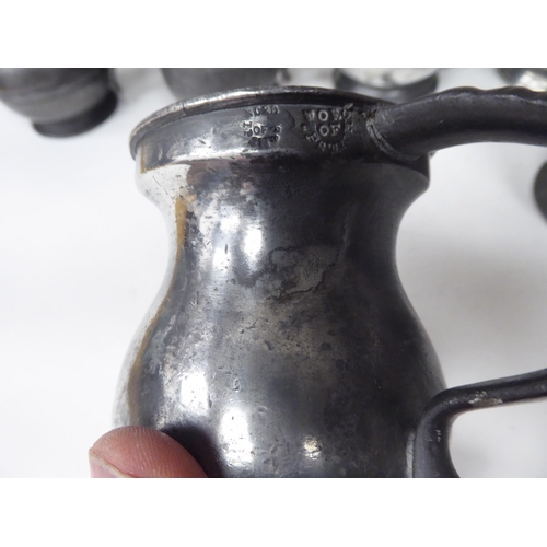 79 - Fourteen 17th and 18thC pewter, baluster shape measures  largest approx. one pint