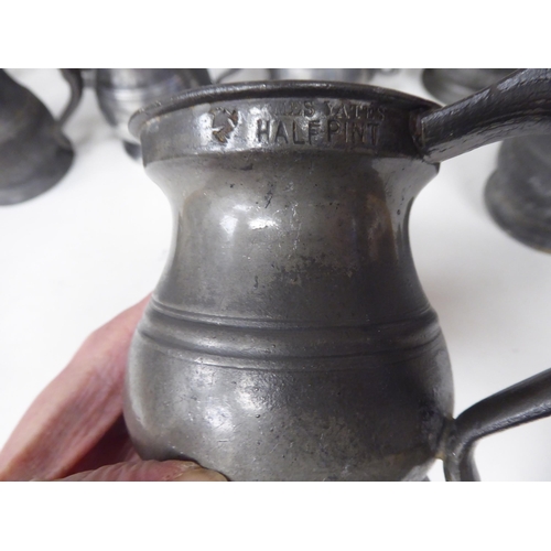 79 - Fourteen 17th and 18thC pewter, baluster shape measures  largest approx. one pint