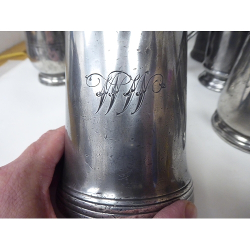 80 - Eighteen 18th and 19thC pewter mugs, one-two pints approx. of varying design