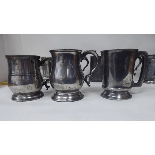 80 - Eighteen 18th and 19thC pewter mugs, one-two pints approx. of varying design