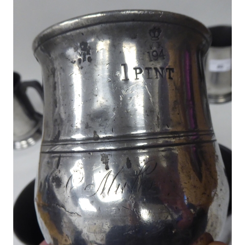 80 - Eighteen 18th and 19thC pewter mugs, one-two pints approx. of varying design