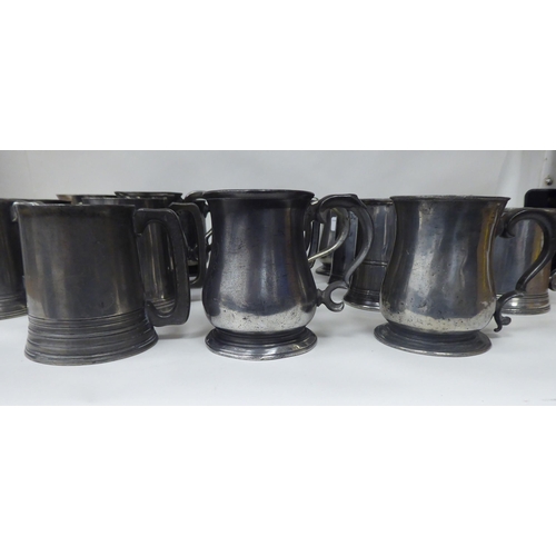 80 - Eighteen 18th and 19thC pewter mugs, one-two pints approx. of varying design