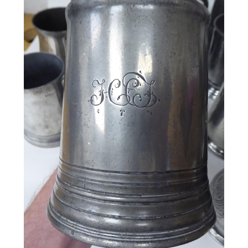 80 - Eighteen 18th and 19thC pewter mugs, one-two pints approx. of varying design