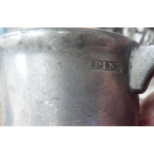 80 - Eighteen 18th and 19thC pewter mugs, one-two pints approx. of varying design