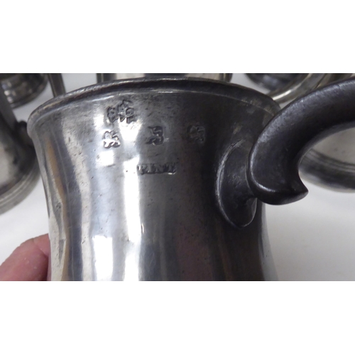 80 - Eighteen 18th and 19thC pewter mugs, one-two pints approx. of varying design