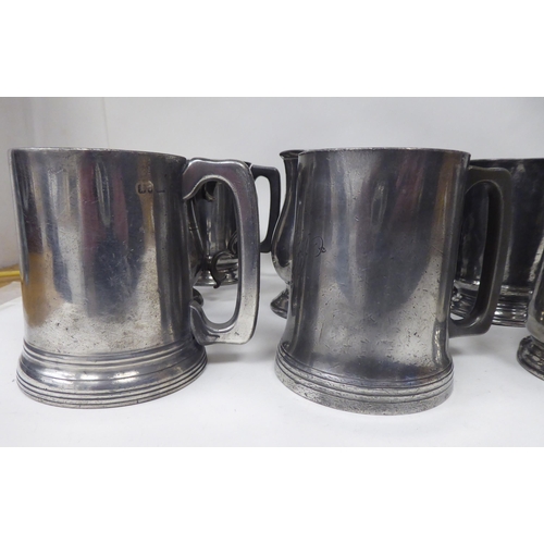 80 - Eighteen 18th and 19thC pewter mugs, one-two pints approx. of varying design