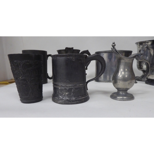 81 - Various 18th and 19thC pewter mugs, one pint and less of varying design