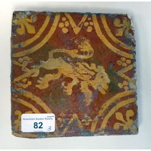 82 - Three dissimilar 18thC earthenware tiles, viz. one in blue and white and colours; another, in geomet... 