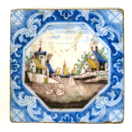 82 - Three dissimilar 18thC earthenware tiles, viz. one in blue and white and colours; another, in geomet... 