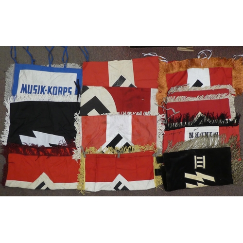 87 - A collection of Nazi era, fabric banners and flags: to include swastika and SS emblems(Please Note: ... 