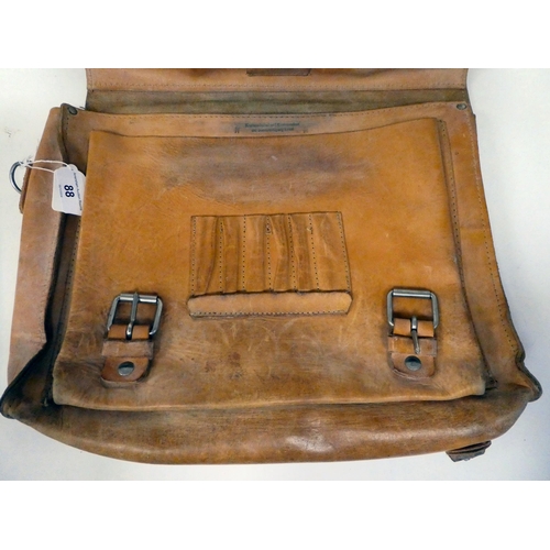 88 - A German Third Reich era stitched, soft pigskin attaché case  bears an impressed emblem(Please Note:... 