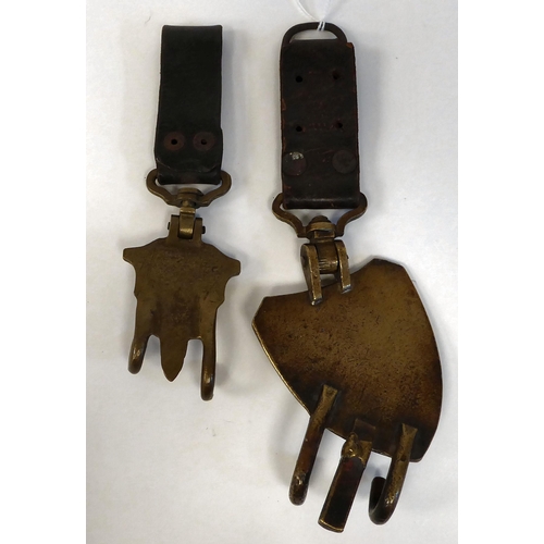 90 - A pair of German brass and brown hide drum hangers(Please Note: this lot is subject to the statement... 