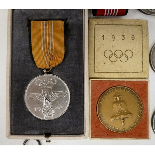 98 - 1936 Berlin Olympic medallions, some with ribbons