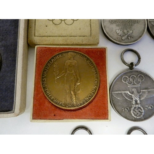 98 - 1936 Berlin Olympic medallions, some with ribbons