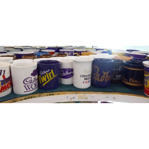 18 - Cadbury's promotional wares: to include china mugs; puzzles; diecast model vehicles; and other colle... 