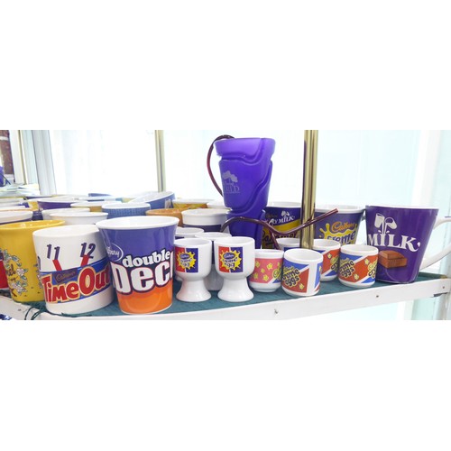 18 - Cadbury's promotional wares: to include china mugs; puzzles; diecast model vehicles; and other colle... 