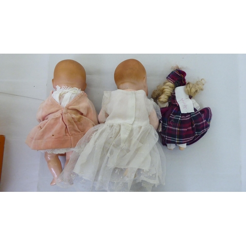 173 - Various composition dolls: to include two early 20thC Armand Marseille bisque head examples  10... 