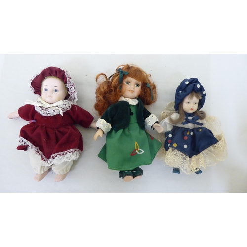 173 - Various composition dolls: to include two early 20thC Armand Marseille bisque head examples  10... 