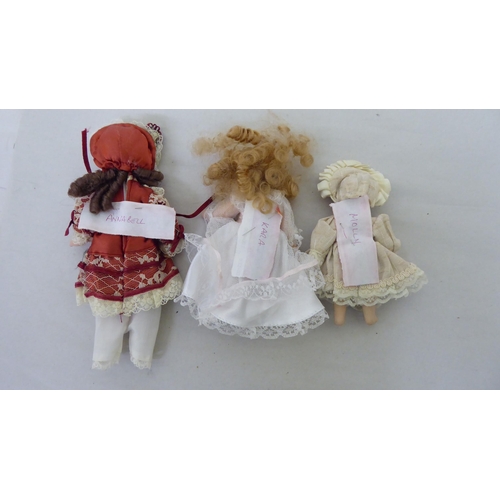 173 - Various composition dolls: to include two early 20thC Armand Marseille bisque head examples  10... 