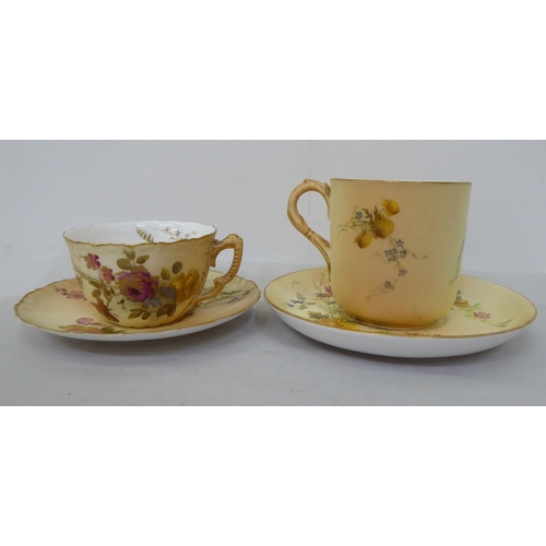 178 - A Royal Worcester china moustache cup and saucer; and another cup and saucer, date cyphers between 1... 