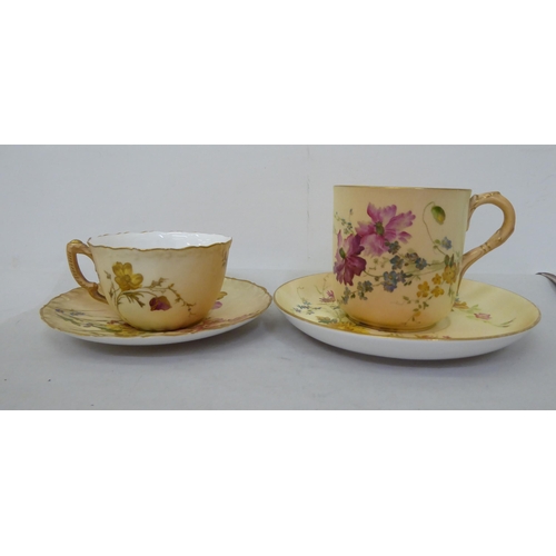 178 - A Royal Worcester china moustache cup and saucer; and another cup and saucer, date cyphers between 1... 