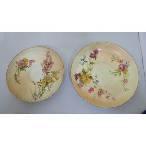 178 - A Royal Worcester china moustache cup and saucer; and another cup and saucer, date cyphers between 1... 