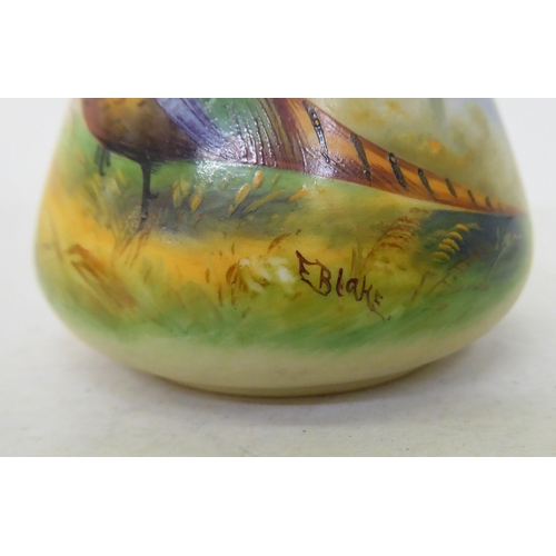 180 - A Locke & Co Worcester china vase, decorated with a pheasant  signed E.Blake  4.5