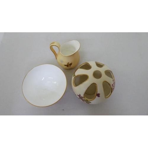 181 - Six items of Royal Worcester blush china collectables: to include a cream jug with gilded ornament, ... 