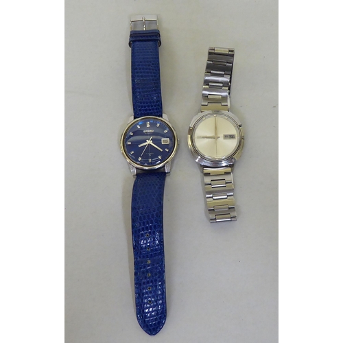 22 - Two Seiko stainless steel cased automatic wristwatches, each faced by a baton dial