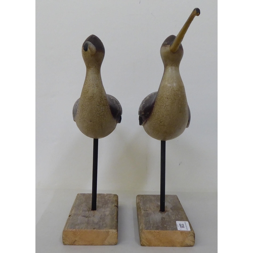 228 - A pair of carved and painted wooden curlews, on platform stands  13