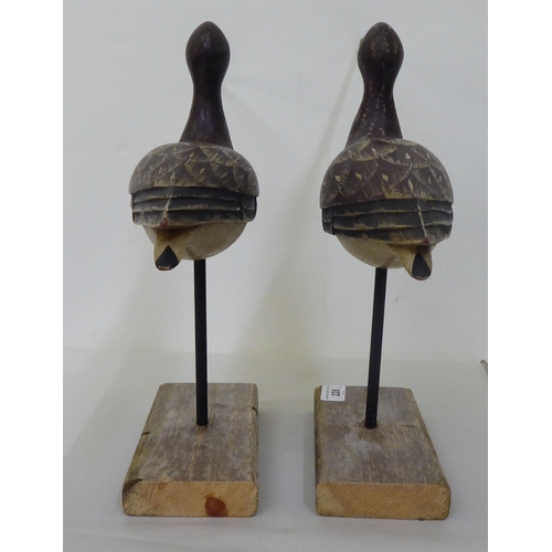 228 - A pair of carved and painted wooden curlews, on platform stands  13