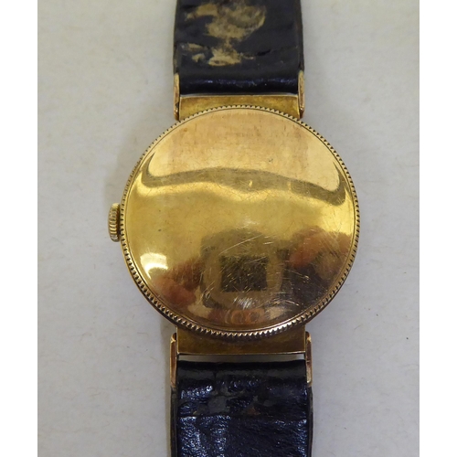 243 - A Longines 9ct gold cased wristwatch, faced by an Arabic dial with a seconds hand, on a dedicated bl... 