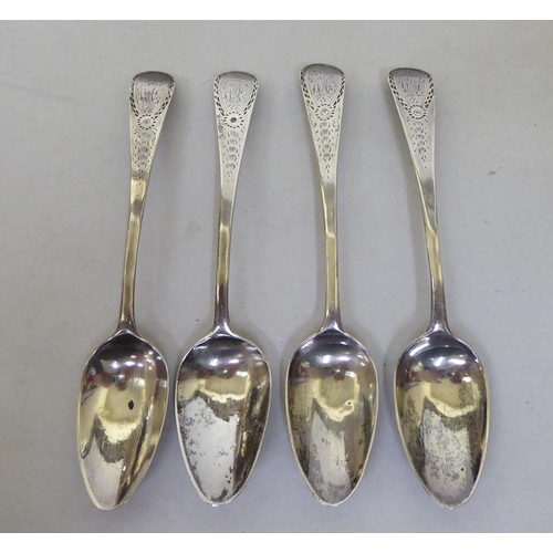 252 - Silver flatware: to include a set of four teaspoons with bright cut engraving  mixed marks