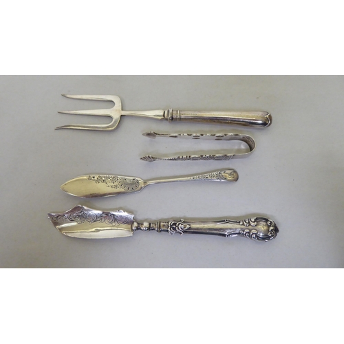 252 - Silver flatware: to include a set of four teaspoons with bright cut engraving  mixed marks