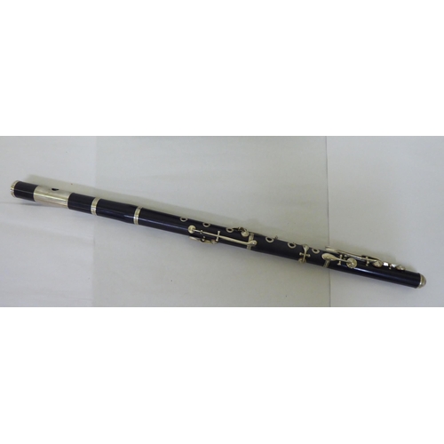 279 - A Nach Meyer wooden, three section flute