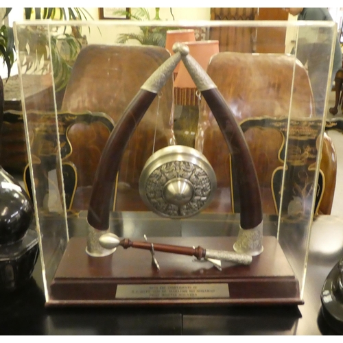 297 - A metal and mahogany presentation gong, in a perspex case  20