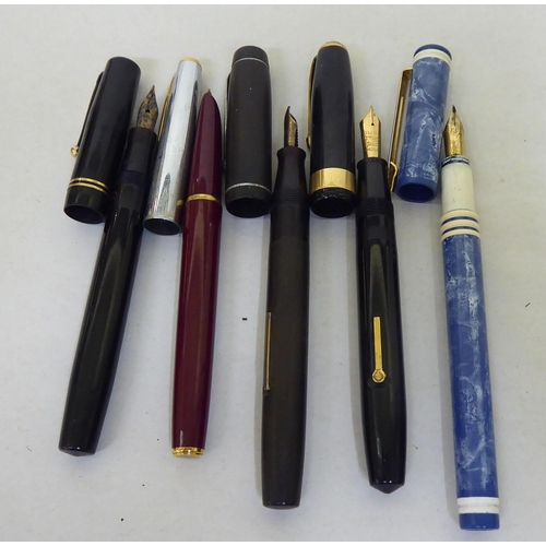 30 - Pens and writing related collectables: to include a Swan fountain pen