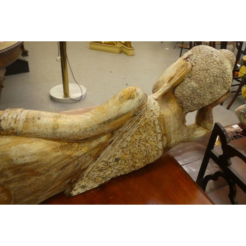 318 - A carved and painted wooden model, a reclining God  38