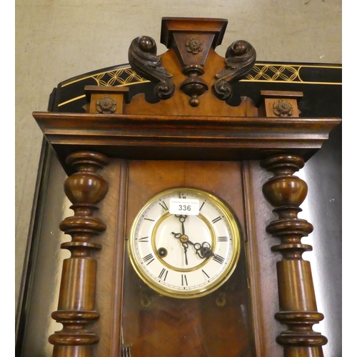 336 - A 20thC stained beech cased wall clock, faced by a Roman dial  28