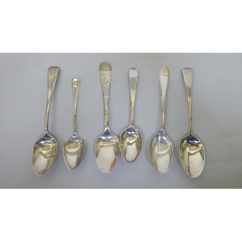 338 - Variously patterned silver and white metal teaspoons  mixed marks  (approx. 17ozs)