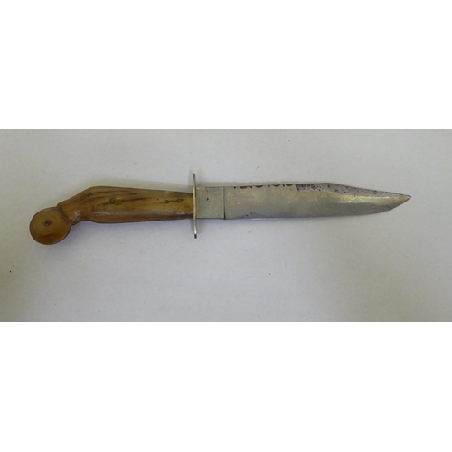 344 - A Texas Bowie knife, on a horn handle  the blade 7