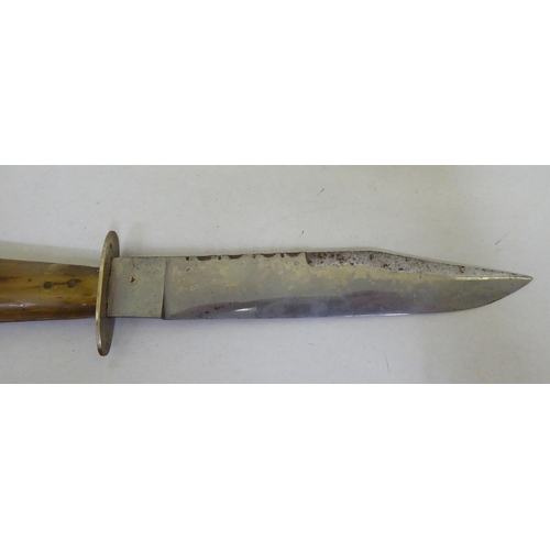 344 - A Texas Bowie knife, on a horn handle  the blade 7