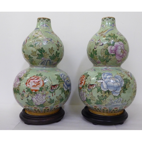 349 - A pair of modern Chinese porcelain, double gourd vases, decorated with animals and flowers  19