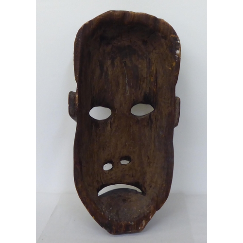 350 - An African tribal softwood mask  27