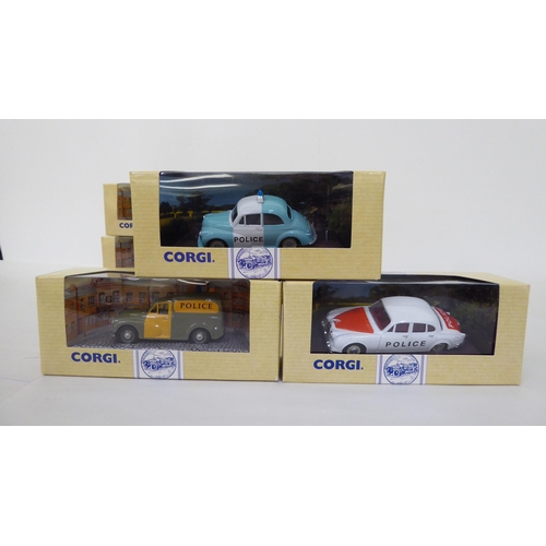 357 - Corgi Classics diecast model vehicles, 'The Corgi Police Collection'  boxed, on a dedicated plinth