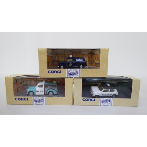 357 - Corgi Classics diecast model vehicles, 'The Corgi Police Collection'  boxed, on a dedicated plinth