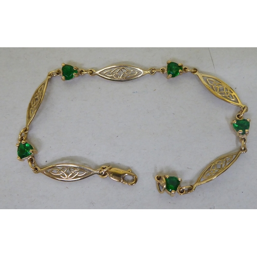 366 - A 9ct gold Irish bracelet, set with green stones